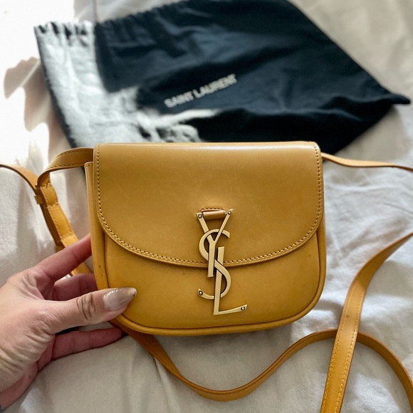 kaia saddle bag by
Saint Laurent crossbody color: mustard yellow - Picture 1 of 4